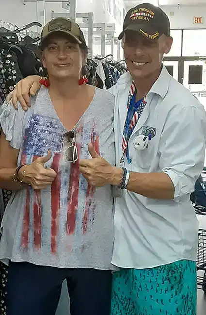 Author and Veteran David Haave with adopted Sissy Rebecca Cinci Goodwill drive Boca Raton FL oceans -- David Haave